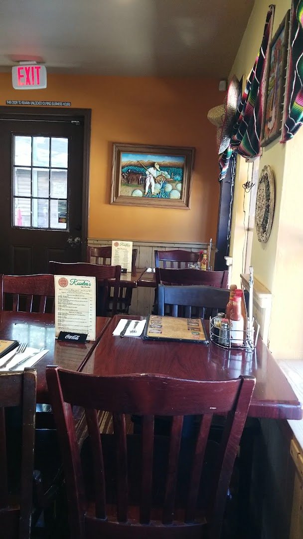 Outdoor tables at a casual Mexican restaurant.